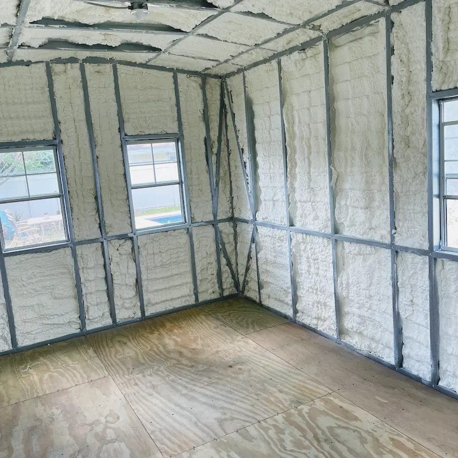 Closed-cell spray foam insulation applied to wall cavities in a residential project in Burkburnett